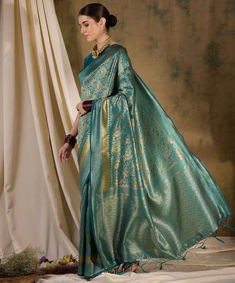 Striking teal banarasi silk saree with weaving details 4