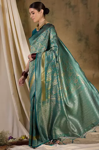 Striking teal banarasi silk saree with weaving details