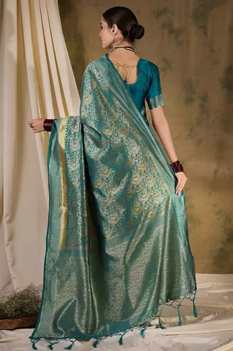 Striking teal banarasi silk saree with weaving details