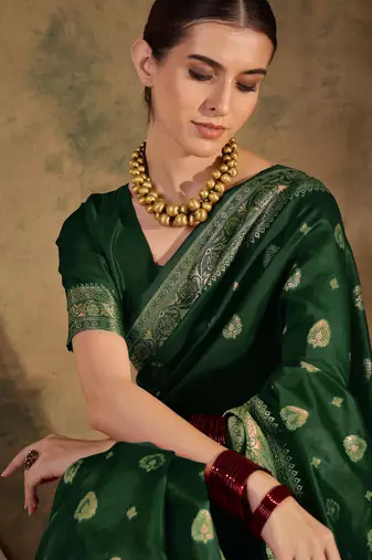 Enchanting green banarasi silk saree with weaving work