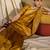 Vibrant mustard banarasi silk saree with weaving work