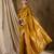 Vibrant mustard banarasi silk saree with weaving work