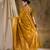 Vibrant mustard banarasi silk saree with weaving work