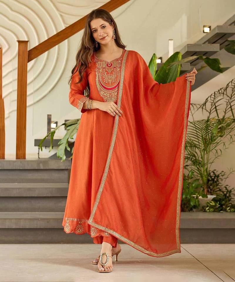 Women's embroidered orange vichitra silk flared kurta, rayon pant & dupatta set