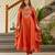 Women's embroidered orange vichitra silk flared kurta, rayon pant & dupatta set