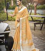 Sangam prints light orange silk woven work traditional saree
