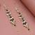 Black & gold kundan pearl earrings with ear chain