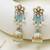 Blue meenakari jhumka earrings with pearl drops