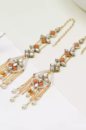 Orange kundan dangler earrings with ear chain