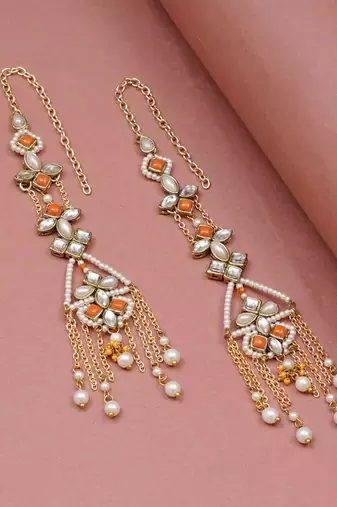 Orange kundan dangler earrings with ear chain