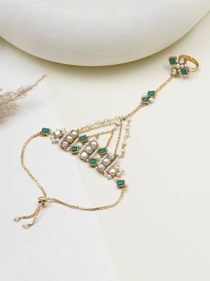 Gold-plated haathphool with emerald accents 4