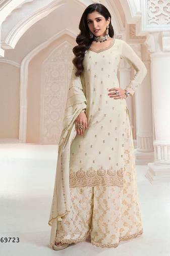 Ivory heavy chinon jacquars silk full stitched free size upto 44 palazzo suits