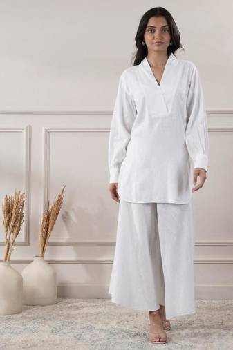 Women white cotton top with flared pants