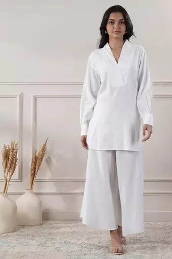 Women white cotton top with flared pants
