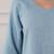 Women smoke blue v-neck dress