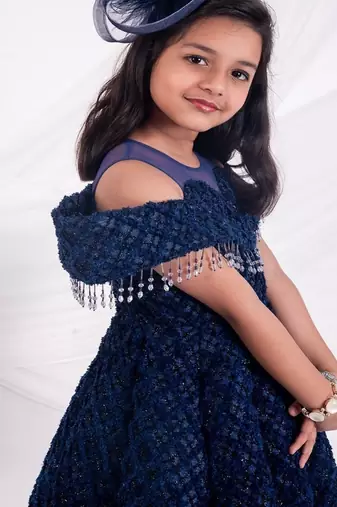 Blue embroidered net girls gown