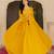 Radiant mustard yellow georgette embroidered gown with dupatta for festive elegance