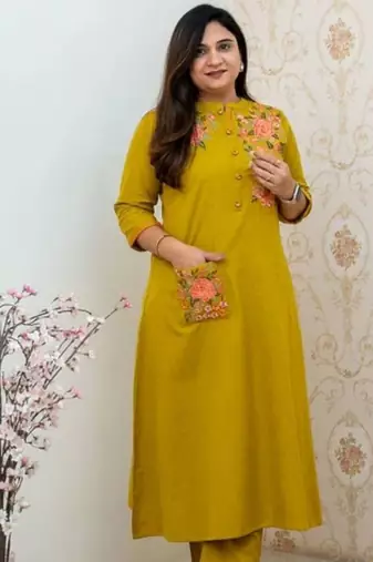 Mustard yellow embroidered cotton kurta and pant set