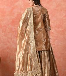 Golden gharara set with zardozi & kundan embroidery