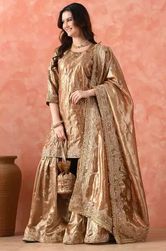 Golden gharara set with zardozi & kundan embroidery