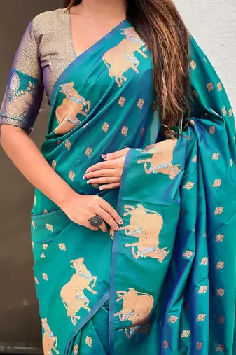 Soft silk dual zari woven saree with nandi border