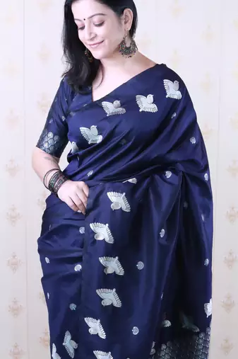 Soft silk dual zari woven saree with bird border