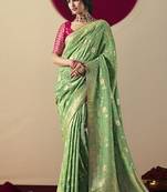 Viscose silk green saree with rich zari weaving & designer tassels
