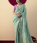 Viscose silk aqua blue saree with rich zari weaving & designer tassels