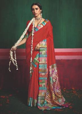 Women red tushar silk blend with zari border and designer pallu 2
