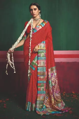 Women red tushar silk with zari border and designer pallu