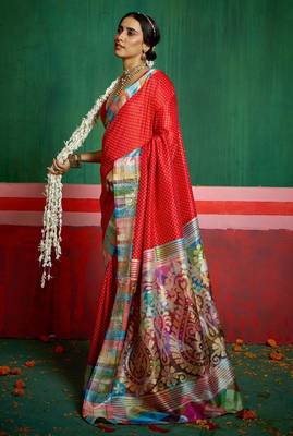 Women red tushar silk blend with zari border and designer pallu 3