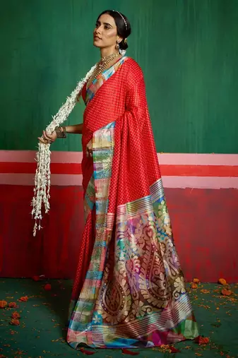 Women red tushar silk with zari border and designer pallu