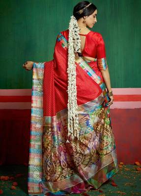 Women red tushar silk blend with zari border and designer pallu 4