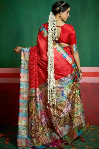 Women red tushar silk with zari border and designer pallu