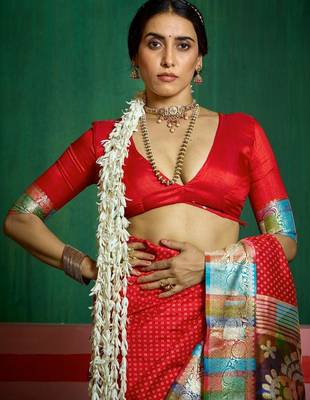 Women red tushar silk blend with zari border and designer pallu 5