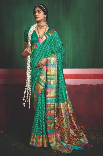 Women bottle green tushar silk with zari border and designer pallu