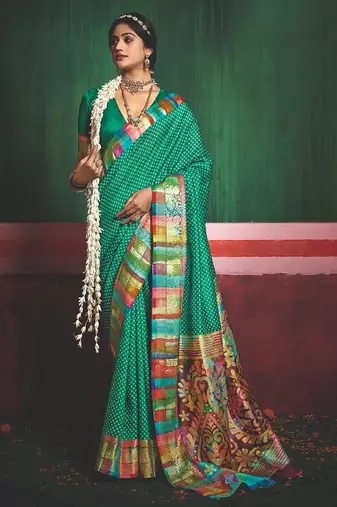 Women bottle green tushar silk with zari border and designer pallu