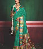 Women bottle green tushar silk with zari border and designer pallu