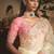 Designer cream tissue organza saree with all over butta work & heavy stone embellished border