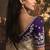 Designer beige tissue organza saree with all over butta work & heavy stone embellished border