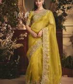 Designer mustard tissue organza saree with all over butta work & heavy stone embellished border