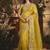 Designer mustard tissue organza saree with all over butta work & heavy stone embellished border