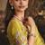 Designer mustard tissue organza saree with all over butta work & heavy stone embellished border