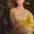 Designer mustard tissue organza saree with all over butta work & heavy stone embellished border