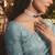 Designer aqua blue tissue organza saree with all over butta work & heavy stone embellished border
