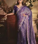 Designer purple tissue organza saree with all over butta work & heavy stone embellished border