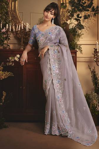 Designer light lilac tissue organza saree with all over butta work & heavy stone embellished border