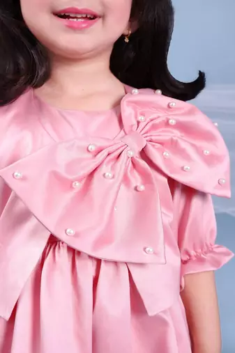 Pink embroidered satin dress paired with jacket