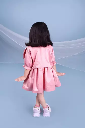 Pink embroidered satin dress paired with jacket