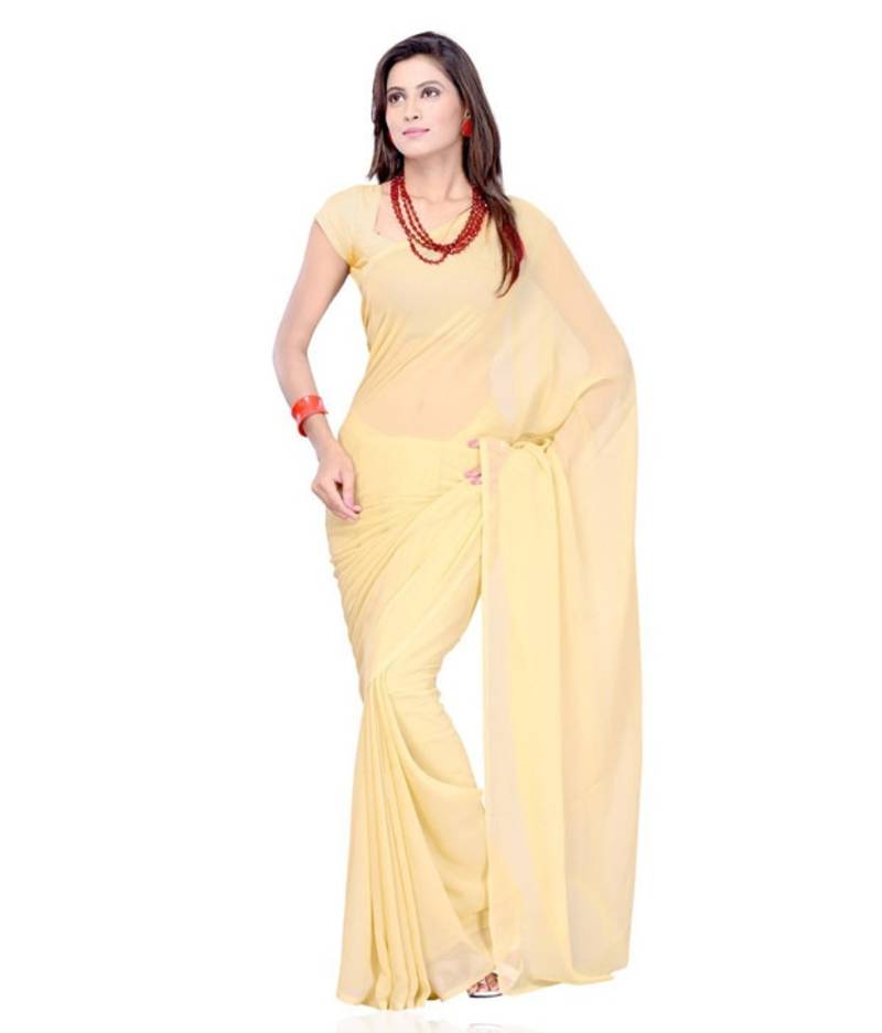 Cream plain georgette saree with blouse